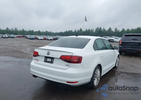 2016 Volkswagen Jetta 1.8T Sel z USA, uszkodzony, nr VIN 3VWL17AJ8GM395429